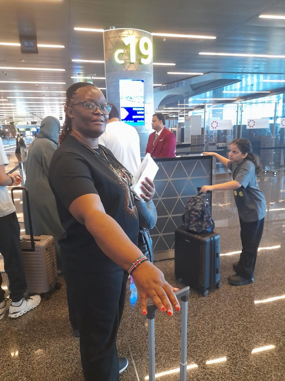 CrossBorder teacher at international airport layover en route to the U.S.