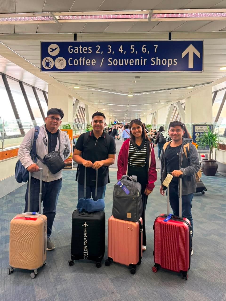 CrossBorder teachers with luggage at the airport