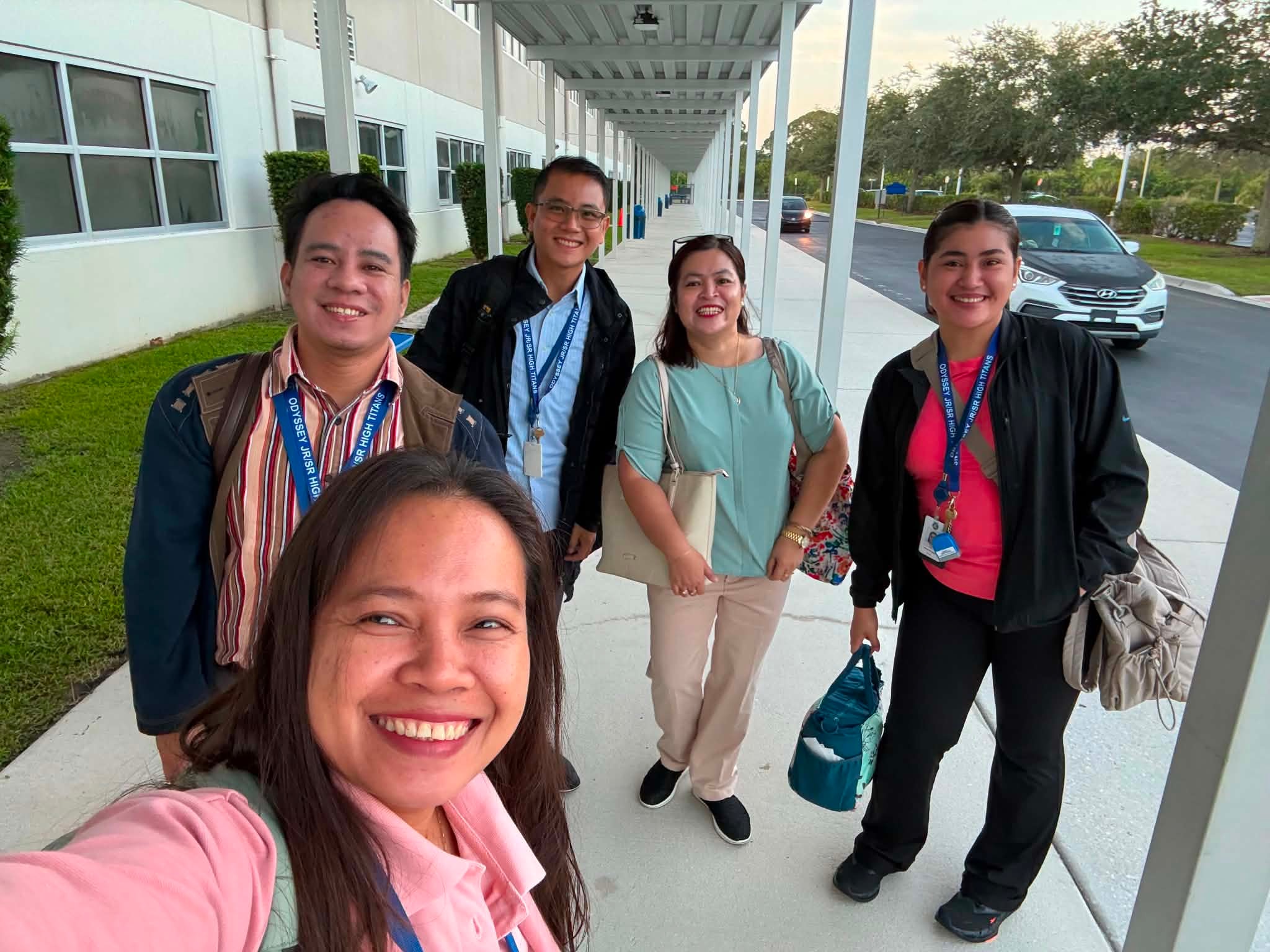 CrossBorder teachers posing outside school building